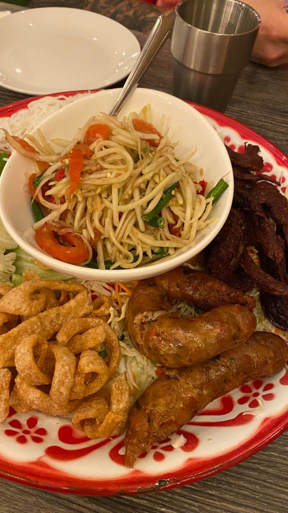 papaya salad, beef jerky, laotian sausage, pork rinds